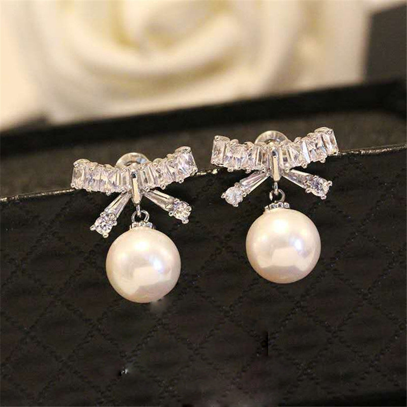 Bow pearl earrings