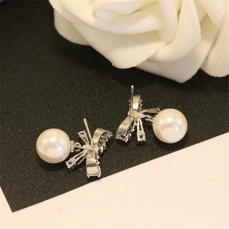 Bow pearl earrings