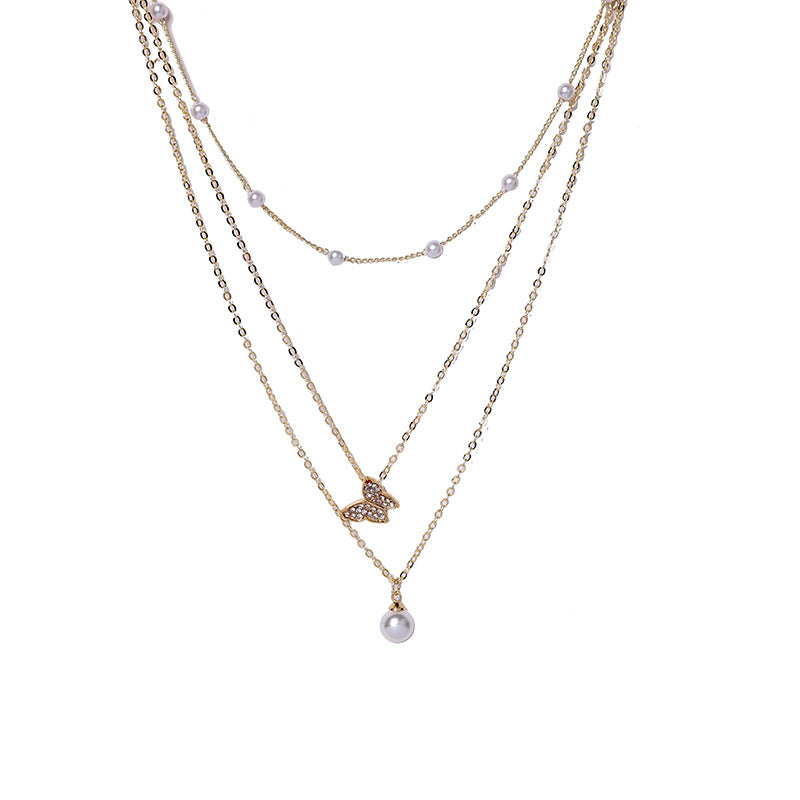 Multi-layered butterfly pearl necklace