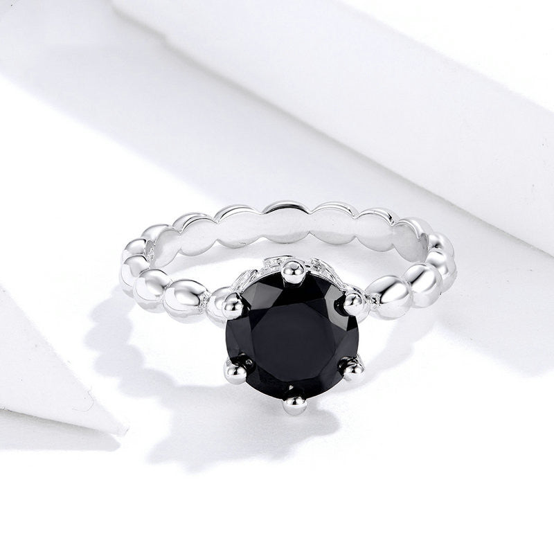 Six claw zircon crown ring