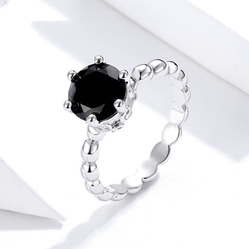 Six claw zircon crown ring