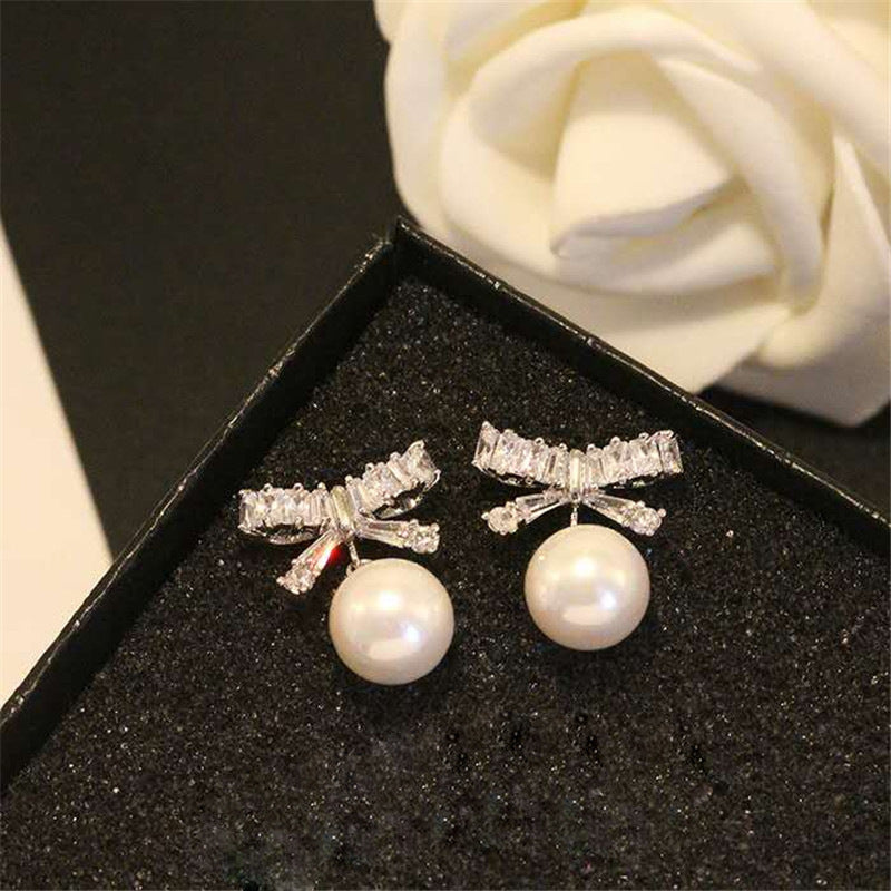 Bow pearl earrings