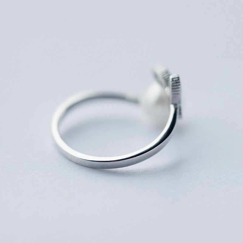 Leaf-studded beaded ring