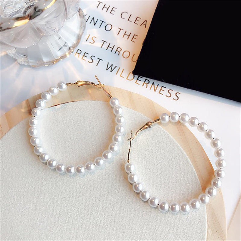 Pearl large circle earrings