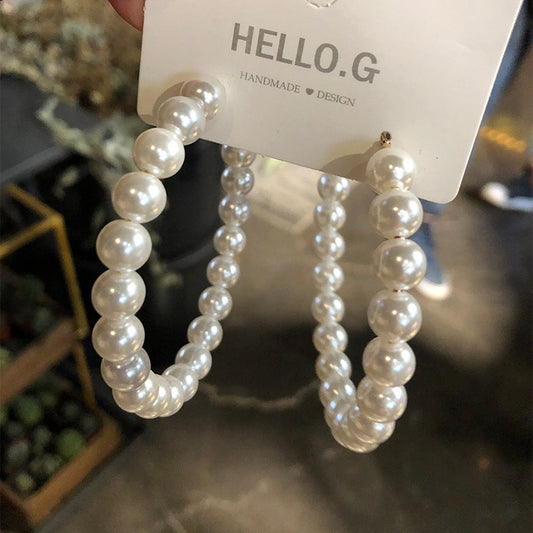 About temperament highlight pearl ear hoop earrings