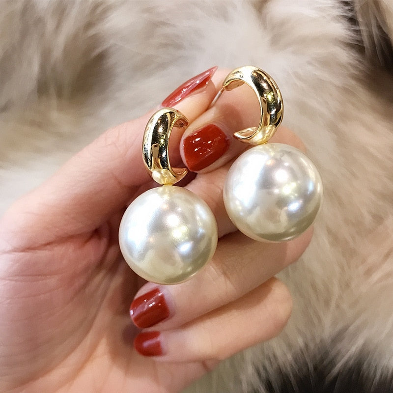 Large pearl earrings