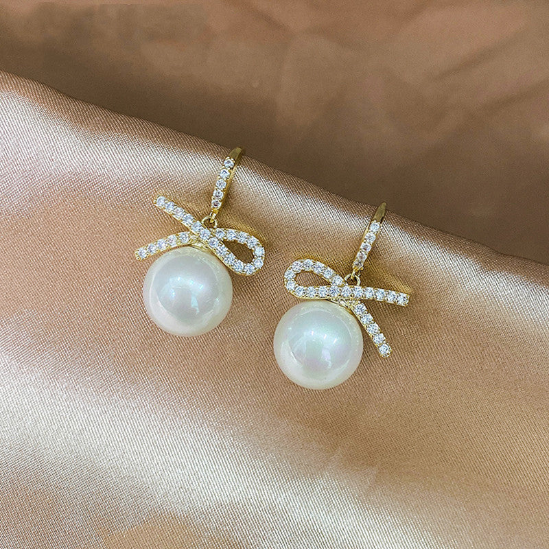 Bow pearl earrings