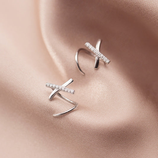 Simple cross unilateral diamond earrings