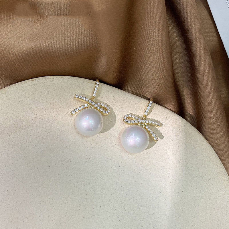 Bow pearl earrings