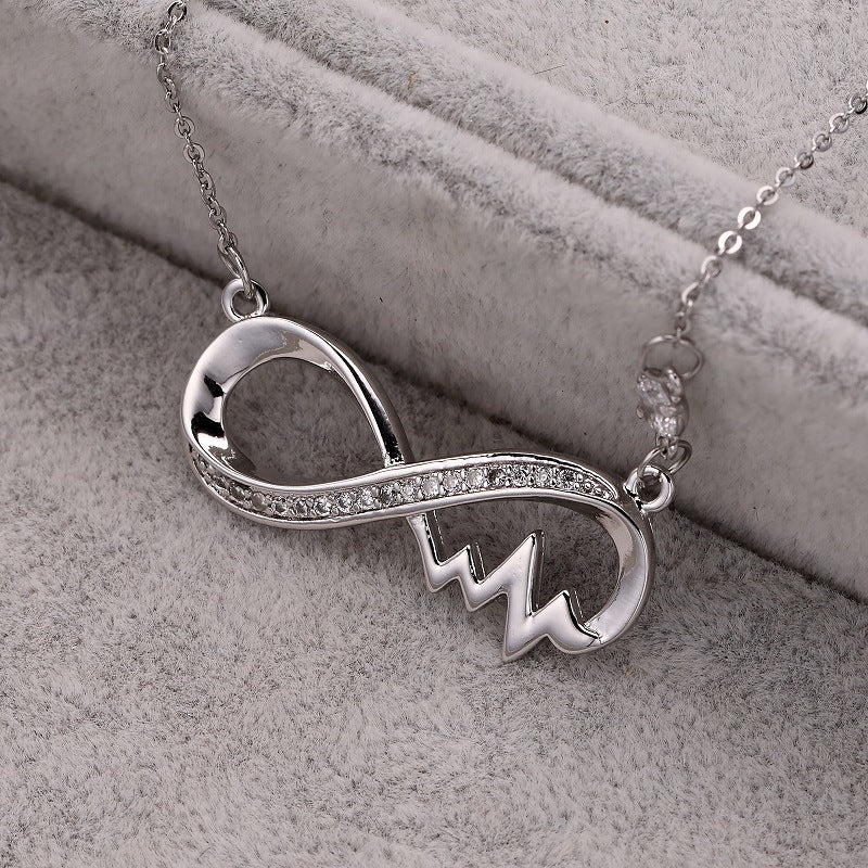 Copper plated platinum and diamond electrocardiogram necklace