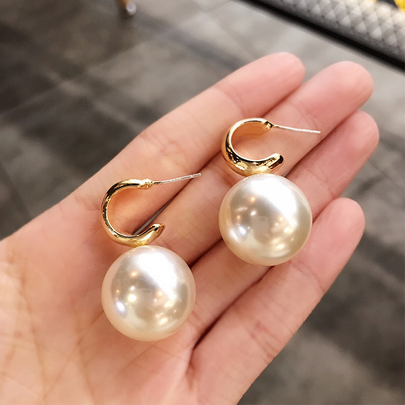 Large pearl earrings