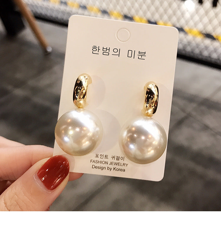 Large pearl earrings