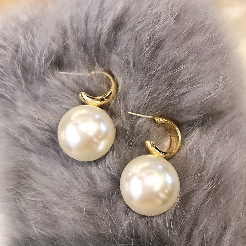 Large pearl earrings