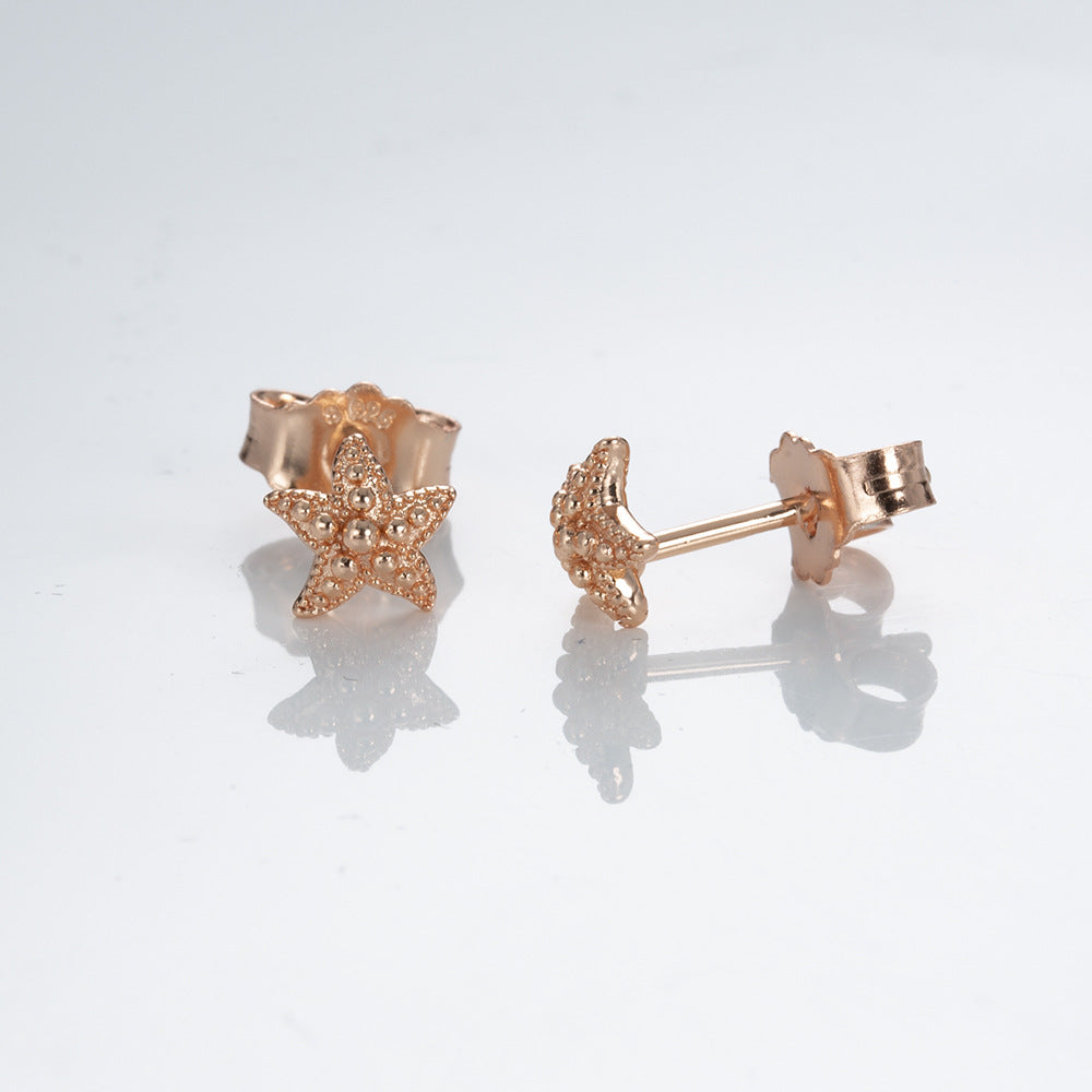 Rose gold pink fan daisy pavé sparkling elegant heart earrings