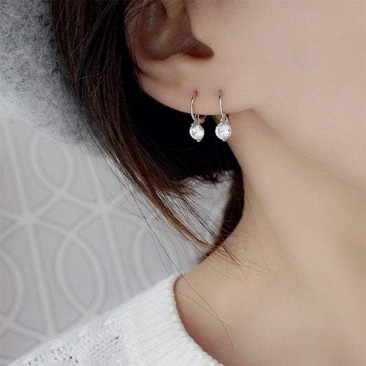 Single loose diamond earring