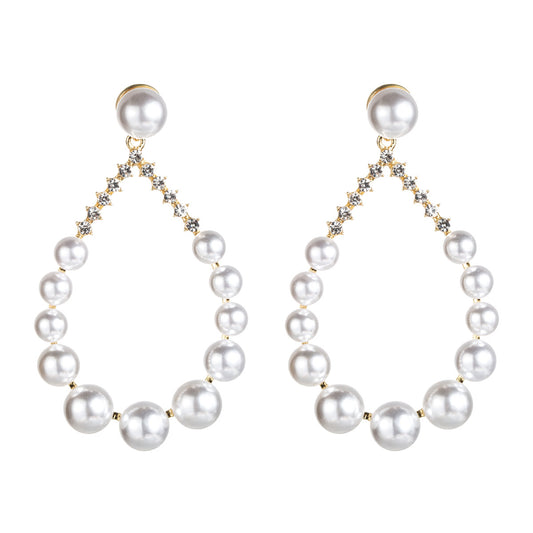 Diamond imitation pearl earrings