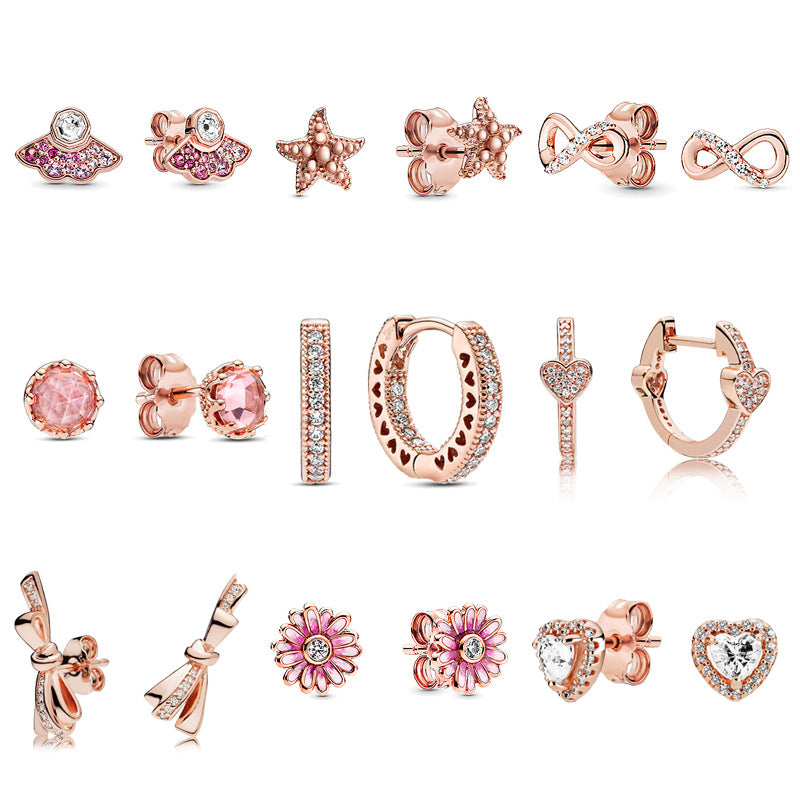 Rose gold pink fan daisy pavé sparkling elegant heart earrings