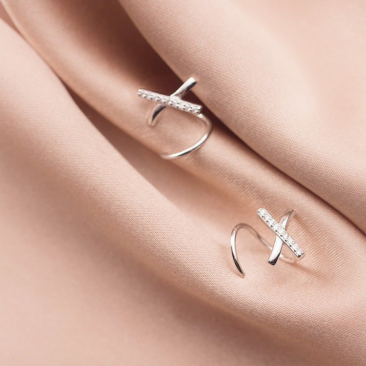 Simple cross unilateral diamond earrings