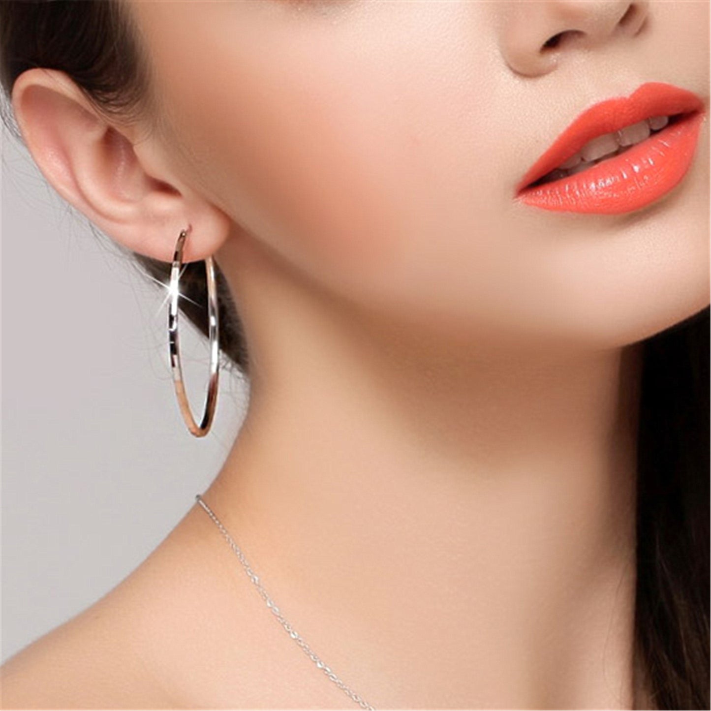 Exaggerated big ear hoop earrings with silver ornaments