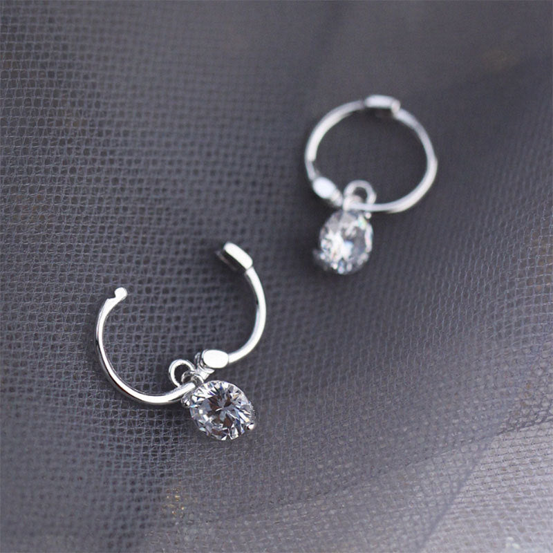 Single loose diamond earring